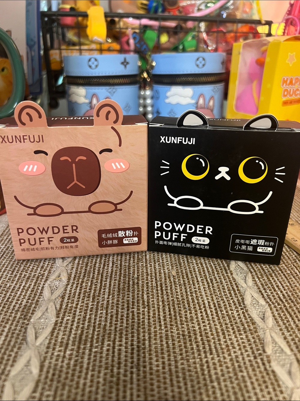 Capybara and black cat powder, puff pads